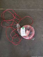 Full view of red wire coil with packaging