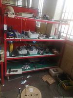 Entire shelving unit with bins and contents