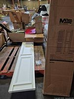 Box showing Mid America branding and door panel partially visible