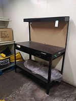 Full view of WORKPRO workbench with pegboard, upper shelf and lower shelf