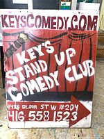 Full frontal view of entire Keys Comedy Club sign