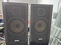 Front view of both Akai SW-T30 speakers