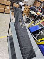 Closed black nylon Impact carry bag on cart