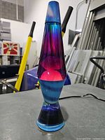 Full view of lava lamp illuminated showing color patterns