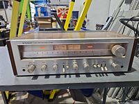 Front view of Pioneer SX-650 receiver showing controls and display