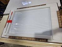 Cabinet inside foam packaging shrink-wrapped