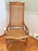 Full view of cane seat rocking chair