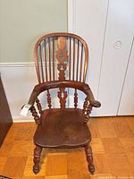 Front view of Windsor armchair showing overall design