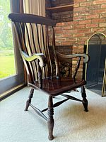 Front three-quarter view showing full chair design and finish