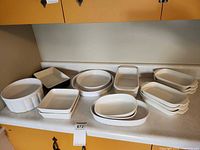 Group shot showing all 14 bakeware pieces on countertop