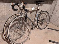 Side view of Bianchi bicycle with spare wheel and U-lock