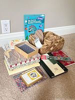 Group shot of all stationery, basket, craft kit