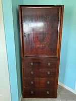 Full cabinet showing upper door and lower drawers