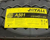 Label on Joyall A501 tire showing size 275/70R22.5 and specifications