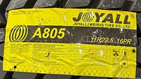 Close-up of Joyall A805 label on tire tread