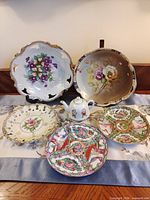 Group shot of all six porcelain items