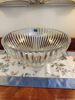 Side view of Bohemia fluted crystal bowl with sticker visible