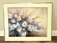 Front view of framed floral print