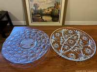 Both glass platters side by side on table