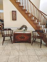 Front view of both Windsor-style armchairs