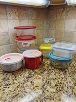 Group view of all containers stacked on counter