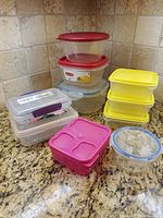 Group shot of all plastic containers with lids