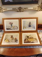 All four framed prints displayed together for full lot view