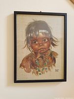Front view of framed signed child portrait print