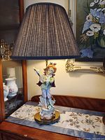 Full view of lamp on table with shade fitted