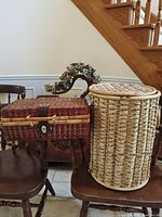 Hamper with lid and picnic basket side by side