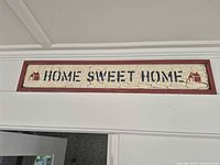 Full view of wood sign over doorway