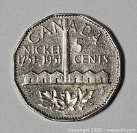 Reverse of 1951 Canadian nickel coin showing refinery design