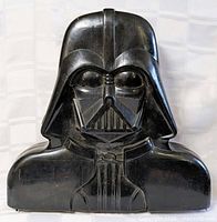 Front view of Darth Vader-shaped case closed