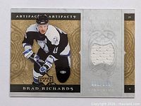 Full card front showing player image, Upper Deck logo and jersey swatch