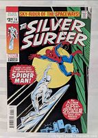 Front cover showing title, issue number, price, Silver Surfer and Spider-Man artwork