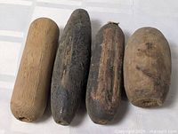 All four wooden floats side by side
