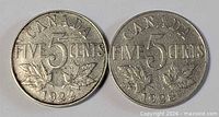 Both coins obverse showing reverse design and dates