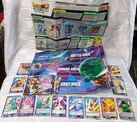 Cards, rule manual, playmat overview