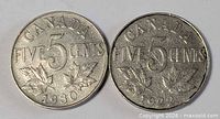 Both Canadian five-cent coins showing reverse sides with dates 1930 and 1922