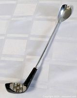 Full view of golf club themed bar spoon