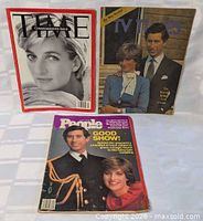 Three magazines laid out: Time, TV Times, People