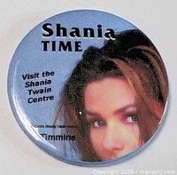 Front view of button showing graphics and text