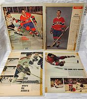 Overview of four vintage Canadiens newspaper cutouts in plastic sleeves