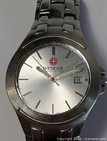 Front view of Wenger watch showing case, bracelet, and dial