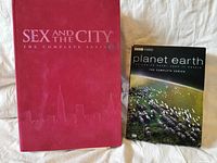 Front view of both DVD box sets