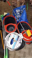 Overview of buckets, gloves box, poles, blue Ikea bag