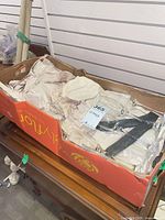 Box containing wrapped stemware pieces