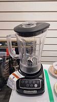 Full view of KitchenAid blender with jar, lid and base