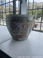 Front view of painted porcelain planter
