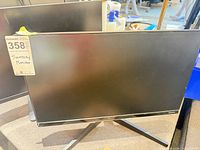 Front view of Samsung 21-inch monitor on stand